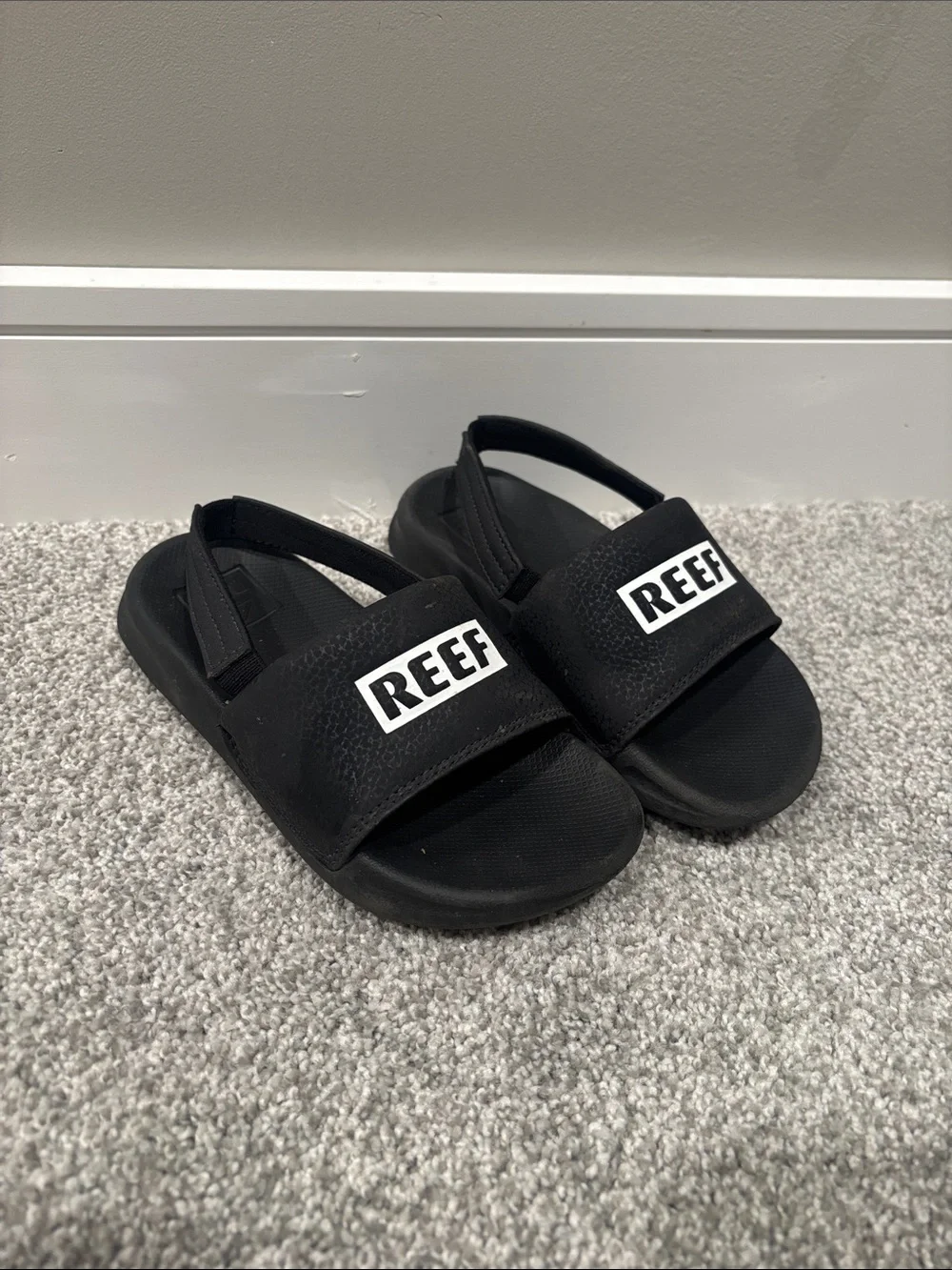 Reef Kids Black Slip-On Sandals with REEF Logo